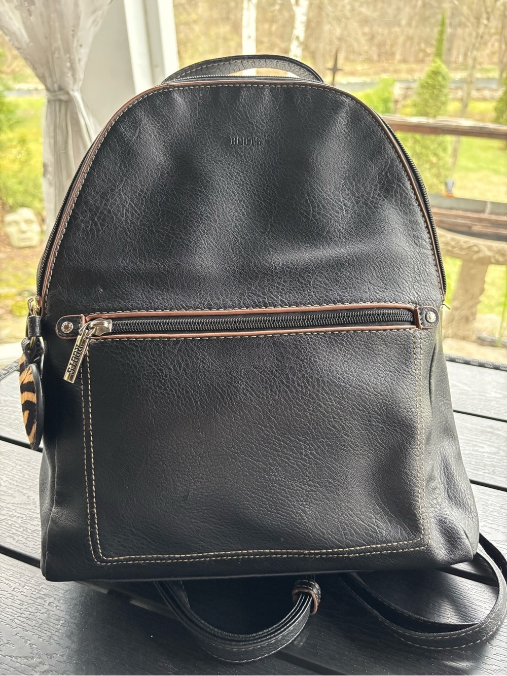 Roots Black Leather Backpack with Brown Trim